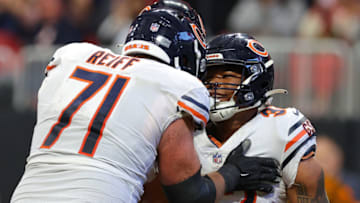 ATLANTA, GEORGIA - NOVEMBER 20: Riley Reiff #71 of the Chicago Bears celebrates with David Montgomery #32 of the Chicago Bears after Montgomery's touchdown during the fourth quarter against the Atlanta Falcons at Mercedes-Benz Stadium on November 20, 2022 in Atlanta, Georgia. (Photo by Kevin C. Cox/Getty Images)