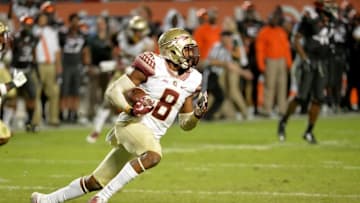 Nov 15, 2014; Miami Gardens, FL, USA; Florida State Seminoles defensive back Jalen Ramsey (8) runs after making an interception during the second half against Miami Hurricanes at Sun Life Stadium. Mandatory Credit: Steve Mitchell-USA TODAY Sports