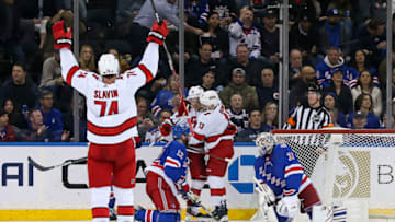 Apr 26, 2022; New York, New York, USA; Carolina Hurricanes left wing Teuvo Teravainen (86) celebrates with Carolina Hurricanes center Max Domi (13) after scoring a goal against New York Rangers during the second period at Madison Square Garden. Mandatory Credit: Tom Horak-USA TODAY Sports