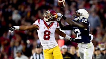 PASADENA, CA - JANUARY 02: Wide receiver Chris Godwin #12 of the Penn State Nittany Lions makes a 72-yard touchdown reception against defensive back Iman Marshall #8 of the USC Trojans in the third quarter of the 2017 Rose Bowl Game presented by Northwestern Mutual at the Rose Bowl on January 2, 2017 in Pasadena, California. (Photo by Harry How/Getty Images)