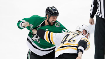 DALLAS, TX - FEBRUARY 26: Dallas Stars Left Wing Jamie Benn (14) and Boston Bruins Right Wing David Backes (42) fight 2 seconds into the NHL hockey game between the Boston Bruins and Dallas Stars on February 26, 2017, at American Airlines Center in Dallas, TX. (Photo by Andrew Dieb/Icon Sportswire via Getty Images)