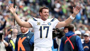 SEATTLE, WASHINGTON - NOVEMBER 04: Philip Rivers #17 of the Los Angeles Chargers celebrates in the fourth quarter against the Seattle Seahawks at CenturyLink Field on November 04, 2018 in Seattle, Washington. (Photo by Abbie Parr/Getty Images)