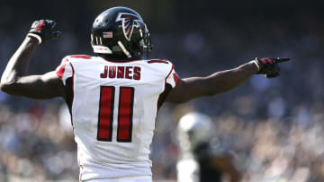 Sep 18, 2016; Oakland, CA, USA; Atlanta Falcons wide receiver Julio Jones (11) reacts after the Falcons scored a touchdown against the Oakland Raiders in the third quarter at Oakland-Alameda County Coliseum. The Falcons defeated the Raiders 35-28. Mandatory Credit: Cary Edmondson-USA TODAY Sports