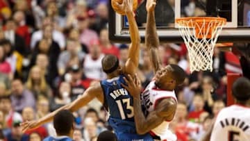 Feb 23, 2014; Portland, OR, USA; Portland Trail Blazers power forward Thomas Robinson (41) blocks Minnesota Timberwolves small forward Corey Brewer (13) in the second half at Moda Center. Mandatory Credit: Jaime Valdez-USA TODAY Sports