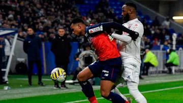 Lille's Brazilian defender Gabriel dos Santos Magalhaes (L) fights for the ball with Lyon's French forward Moussa Dembele during the French League Cup semifinal football match between Olympique Lyonnais and Lille LOSC at the Groupama stadium in Decines-Charpieu near Lyon, central eastern France on January 21, 2020. (Photo by JEAN-PHILIPPE KSIAZEK / AFP) (Photo by JEAN-PHILIPPE KSIAZEK/AFP via Getty Images)