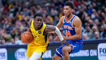 INDIANAPOLIS, IN - MARCH 12: Darren Collison #2 of the Indiana Pacers dribbles the ball against Nate Laszewski #14 of the Notre Dame Fighting Irish at Bankers Life Fieldhouse on March 12, 2019 in Indianapolis, Indiana. NOTE TO USER: User expressly acknowledges and agrees that, by downloading and or using this photograph, User is consenting to the terms and conditions of the Getty Images License Agreement. (Photo by Michael Hickey/Getty Images)