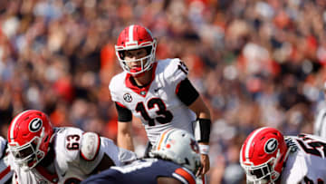 Oct 9, 2021; Auburn, Alabama, USA; Georgia Bulldogs quarterback Stetson Bennett (13) looks at the Auburn defense during the first quarter at Jordan-Hare Stadium. Mandatory Credit: John Reed-USA TODAY Sports
