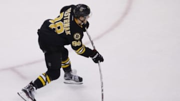 Feb 24, 2016; Boston, MA, USA; Boston Bruins right wing David Pastrnak (88) shoots a penalty shot goal onPittsburgh Penguins goalie Marc-Andre Fleury (not pictured) during the first period at TD Garden. Mandatory Credit: Greg M. Cooper-USA TODAY Sports