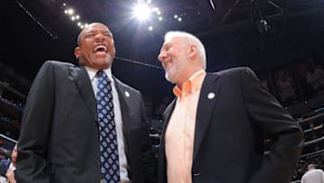 LOS ANGELES, CA - NOVEMBER 10: Head coach Doc Rivers of the Los Angeles Clippers and head coach Gregg Popovich of the San Antonio Spurs have a laugh before the game on November 10, 2014 at STAPLES CENTER in Los Angeles, California. NOTE TO USER: User expressly acknowledges and agrees that, by downloading and or using this Photograph, user is consenting to the terms and conditions of the Getty Images License Agreement. Mandatory Copyright Notice: Copyright 2014 NBAE (Photo by Andrew Bernstein/NBAE via Getty Images)
