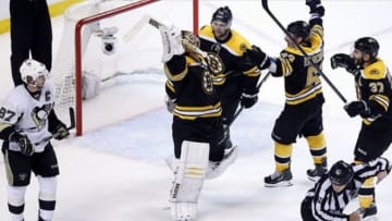 Jun 5, 2013; Boston, MA, USA; Boston Bruins goalie Tuukka Rask (40) celebrates defeating the Pittsburgh Penguins 1-0 in game four of the Eastern Conference finals of the 2013 Stanley Cup Playoffs at TD Garden. Mandatory Credit: Greg M. Cooper-USA TODAY Sports