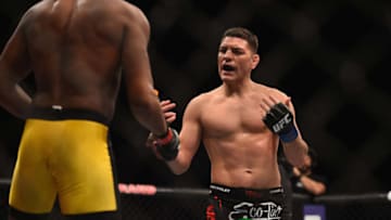 LAS VEGAS, NV - JANUARY 31: (R-L) Nick Diaz taunts Anderson Silva in their middleweight bout during the UFC 183 event at the MGM Grand Garden Arena on January 31, 2015 in Las Vegas, Nevada. (Photo by Jeff Bottari/Zuffa LLC/Zuffa LLC via Getty Images)