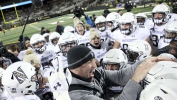 IOWA CITY, IOWA- NOVEMBER 10: Head coach Pat Fitzgerald of the Northwestern Wildcats celebrates with his team after their defeat of the Iowa Hawkeyes, on November 10, 2018 at Kinnick Stadium, in Iowa City, Iowa. (Photo by Matthew Holst/Getty Images)