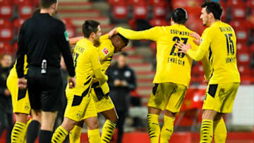 Youssoufa Moukoko (C) celebrates after scoring his first senior goal (Photo by ANNEGRET HILSE/POOL/AFP via Getty Images)
