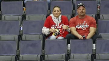 Apr 15, 2015; Washington, DC, USA; Washington Capitals fans sit in the stands in the final minute of the third period against the New York Islanders in game one of the first round of the the 2015 Stanley Cup Playoffs at Verizon Center. The Islanders won 4-1, and lead the series 1-0. Mandatory Credit: Geoff Burke-USA TODAY Sports