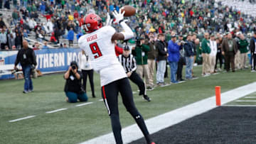 BIRMINGHAM, AL - DECEMBER 23: T.J. Vasher #9 of the Texas Tech Red Raiders makes a touchdown reception to give his team the lead against the South Florida Bulls in the second half of the Birmingham Bowl at Legion Field on December 23, 2017 in Birmingham, Alabama. South Florida won 38-34. (Photo by Joe Robbins/Getty Images)
