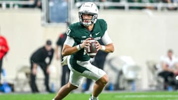 Michigan State's Payton Thorne rolls out on a pass play against Western Kentucky during the third quarter on Saturday, Oct. 2, 2021, at Spartan Stadium in East Lansing.211002 Msu Wku Fb 177a