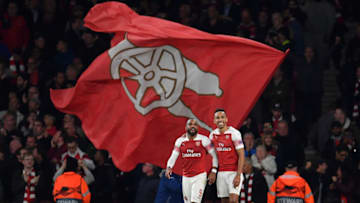 LONDON, ENGLAND - MAY 02: Pierre-Emerick Aubameyang of Arsenal celebrates after scoring his team's third goal with Alexandre Lacazette during the UEFA Europa League Semi Final First Leg match between Arsenal and Valencia at Emirates Stadium on May 02, 2019 in London, England. (Photo by Justin Setterfield/Getty Images)
