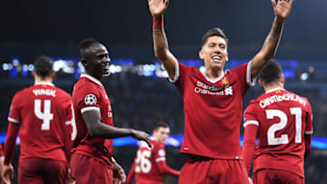 MANCHESTER, ENGLAND - APRIL 10: Roberto Firmino of Liverpool celebrates after scoring his sides second goal during the UEFA Champions League Quarter Final Second Leg match between Manchester City and Liverpool at Etihad Stadium on April 10, 2018 in Manchester, England. (Photo by Laurence Griffiths/Getty Images,)