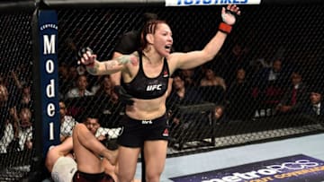 LAS VEGAS, NV - MARCH 03: Cris Cyborg of Brazil celebrates after her TKO victory over Yana Kunitskaya of Russia in their women's featherweight bout during the UFC 222 event inside T-Mobile Arena on March 3, 2018 in Las Vegas, Nevada. (Photo by Jeff Bottari/Zuffa LLC/Zuffa LLC via Getty Images)