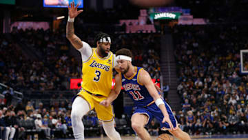 SAN FRANCISCO, CALIFORNIA - FEBRUARY 12: Klay Thompson #11 of the Golden State Warriors drives to the basket against Anthony Davis #3 of the Los Angeles Lakers in the second half at Chase Center on February 12, 2022 in San Francisco, California. NOTE TO USER: User expressly acknowledges and agrees that, by downloading and/or using this photograph, User is consenting to the terms and conditions of the Getty Images License Agreement. (Photo by Lachlan Cunningham/Getty Images)