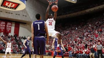 Jan 23, 2016; Bloomington, IN, USA; Indiana Hoosiers center Thomas Bryant (31) dunks against Northwestern Wildcats center Joey van Zegeren (1) at Assembly Hall. Mandatory Credit: Brian Spurlock-USA TODAY Sports