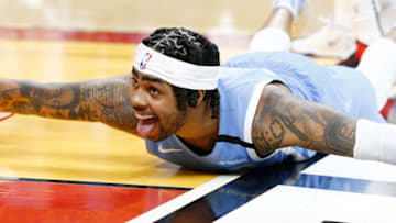 D'Angelo Russell of the Minnesota Timberwolves reacts after blocking a shot by Jimmy Butler of the Miami Heat. (Photo by Michael Reaves/Getty Images)
