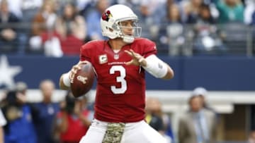 Nov 2, 2014; Arlington, TX, USA; Arizona Cardinals quarterback Carson Palmer (3) throws in the pocket against the Dallas Cowboys at AT&T Stadium. Mandatory Credit: Matthew Emmons-USA TODAY Sports