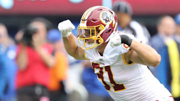 EAST RUTHERFORD, NJ - OCTOBER 28: Ryan Kerrigan #91 of the Washington Redskins reacts after sacking Eli Manning #10 of the New York Giants during the third quarter at MetLife Stadium on October 28, 2018 in East Rutherford, New Jersey. (Photo by Elsa/Getty Images)