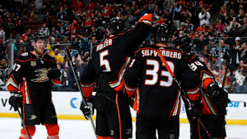 ANAHEIM, CA - APRIL 5: Hampus Lindholm #47, Korbinian Holzer #5, Jakob Silfverberg #33, and Sam Steel #34 of the Anaheim Ducks celebrate a third period goal during the game against the Los Angeles Kings on April 5, 2019 at Honda Center in Anaheim, California. (Photo by Debora Robinson/NHLI via Getty Images)