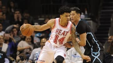 Feb 5, 2016; Charlotte, NC, USA; Miami Heat guard forward Gerald Green (14) drives past Charlotte Hornets guard Jeremy Lin (7) during the second half of the game at Time Warner Cable Arena. The Heat won 98-95. Mandatory Credit: Sam Sharpe-USA TODAY Sports
