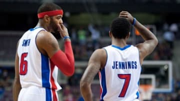 Mar 26, 2014; Auburn Hills, MI, USA; Detroit Pistons forward Josh Smith (6) talks with guard Brandon Jennings (7) during the fourth quarter against the Cleveland Cavaliers at The Palace of Auburn Hills. Cleveland won 97-96. Mandatory Credit: Tim Fuller-USA TODAY Sports
