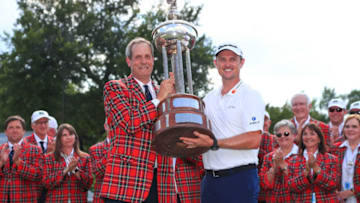 FORT WORTH, TX - MAY 27: Colonial Country Club President Rob Doby presents the trophy to Justin Rose of England after he won the Fort Worth Invitational at Colonial Country Club on May 27, 2018 in Fort Worth, Texas. (Photo by Tom Pennington/Getty Images)