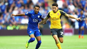 LEICESTER, ENGLAND - AUGUST 20: Riyad Mahrez of Leicester City and Hector Bellerin of Arsenal battle for possession during the Premier League match between Leicester City and Arsenal at The King Power Stadium on August 20, 2016 in Leicester, England. (Photo by Michael Steele/Getty Images)