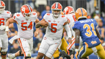 Clemson quarterback D.J. Uiagalelei (5) runs for a first down during the first quarter at Heinz Field in Pittsburgh, Pennsylvania, Saturday, October 23, 2021.Ncaa Football Clemson At Pitt