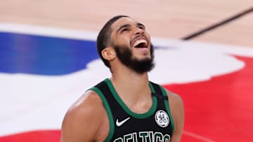 LAKE BUENA VISTA, FLORIDA - SEPTEMBER 11: Jayson Tatum #0 of the Boston Celtics reacts after their win against the Toronto Raptors in Game Seven of the Eastern Conference Second Round during the 2020 NBA Playoffs at AdventHealth Arena at the ESPN Wide World Of Sports Complex on September 11, 2020 in Lake Buena Vista, Florida. NOTE TO USER: User expressly acknowledges and agrees that, by downloading and or using this photograph, User is consenting to the terms and conditions of the Getty Images License Agreement. (Photo by Michael Reaves/Getty Images)
