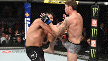 NEW YORK, NEW YORK - NOVEMBER 02: (R-L) Darren Till of England knees Kelvin Gastelum in their middleweight bout during the UFC 244 event at Madison Square Garden on November 02, 2019 in New York City. (Photo by Josh Hedges/Zuffa LLC via Getty Images)