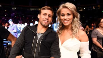NASHVILLE, TN - APRIL 22: (L-R) UFC legend Urijah Faber and strawweight contender Paige VanZant pose for a photo during the UFC Fight Night event at Bridgestone Arena on April 22, 2017 in Nashville, Tennessee. (Photo by Jeff Bottari/Zuffa LLC/Zuffa LLC via Getty Images)