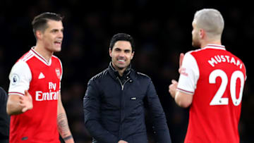 LONDON, ENGLAND - FEBRUARY 23: Mikel Arteta, Granit Xhaka and Shkodran Mustafi of Arsenal celebrate during the Premier League match between Arsenal FC and Everton FC at Emirates Stadium on February 23, 2020 in London, United Kingdom. (Photo by Catherine Ivill/Getty Images)