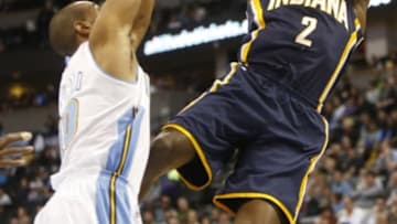 Dec 20, 2014; Denver, CO, USA; Indiana Pacers guard Rodney Stuckey (2) shoots the ball over Denver Nuggets guard Arron Afflalo (10) during the first half at Pepsi Center. Mandatory Credit: Chris Humphreys-USA TODAY Sports