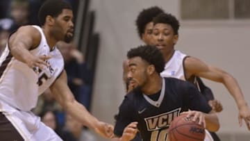 Feb 7, 2015; St. Bonaventure, NY, USA; Virginia Commonwealth Rams guard Jonathan Williams (10) drives the ball past the defense of St. Bonaventure Bonnies during the first half of a game at the Reilly Center. Mandatory Credit: Mark Konezny-USA TODAY Sports