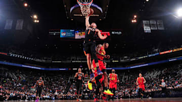 PHOENIX, AZ - FEBRUARY 2: Devin Booker #1 of the Phoenix Suns dunks the ball against the Atlanta Hawks on February 2, 2019 at Talking Stick Resort Arena in Phoenix, Arizona. NOTE TO USER: User expressly acknowledges and agrees that, by downloading and or using this photograph, user is consenting to the terms and conditions of the Getty Images License Agreement. Mandatory Copyright Notice: Copyright 2019 NBAE (Photo by Barry Gossage/NBAE via Getty Images)