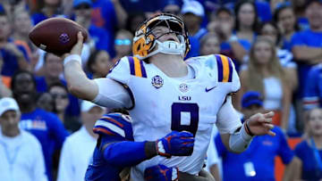 GAINESVILLE, FL - OCTOBER 06: Joe Burrow #9 of the LSU Tigers is tackled by Jachai Polite #99 of the Florida Gators during the game at Ben Hill Griffin Stadium on October 6, 2018 in Gainesville, Florida. (Photo by Sam Greenwood/Getty Images)