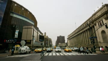 NEW YORK - MAY 21: Madison Square Garden (L) and the Farley Post Office sit on the opposite sides of Eighth Avenue, May 21, 2004 in New York City. The sites will be connected by a planned bridge across Eighth Ave. for the GOP convention. (Photo by Chris Hondros/Getty Images)