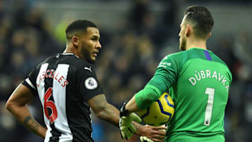 Jamaal Lascelles of Newcastle United with team mate Martin Dubravka. (Photo by Mark Runnacles/Getty Images)