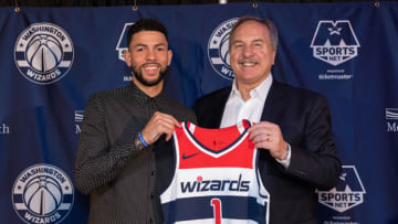 WASHINGTON, DC - JULY 02: General Manager, Ernie Grunfeld poses for a photo with Austin Rivers #1 of the Washington Wizards during a press conference at Capital One Arena in Washington, DC on July 2, 2018. NOTE TO USER: User expressly acknowledges and agrees that, by downloading and/or using this photograph, user is consenting to the terms and conditions of the Getty Images License Agreement. Mandatory Copyright Notice: Copyright 2018 NBAE (Photo by Stephen Gosling/NBAE via Getty Images)