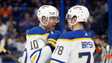 Apr 10, 2022; Tampa, Florida, USA; Buffalo Sabres defenseman Henri Jokiharju (10) and Buffalo Sabres defenseman Jacob Bryson (78) talk against the Tampa Bay Lightning during the third period at Amalie Arena. Mandatory Credit: Kim Klement-USA TODAY Sports