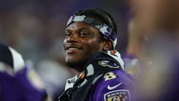 BALTIMORE, MD - AUGUST 11: Lamar Jackson #8 of the Baltimore Ravens looks on against the Tennessee Titans during the second half at M&T Bank Stadium on August 11, 2022 in Baltimore, Maryland. (Photo by Scott Taetsch/Getty Images)