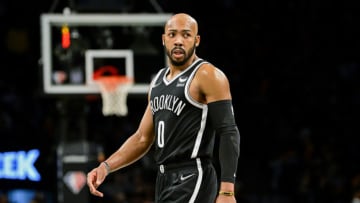 NEW YORK, NEW YORK - FEBRUARY 08: Jevon Carter #0 of the Brooklyn Nets reacts during the game against the Boston Celtics at Barclays Center on February 08, 2022 in New York City. NOTE TO USER: User expressly acknowledges and agrees that, by downloading and or using this photograph, User is consenting to the terms and conditions of the Getty Images License Agreement. (Photo by Steven Ryan/Getty Images)