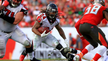 TAMPA, FLORIDA - DECEMBER 29: Devonta Freeman #24 of the Atlanta Falcons rushes during a game against the Tampa Bay Buccaneers at Raymond James Stadium on December 29, 2019 in Tampa, Florida. (Photo by Mike Ehrmann/Getty Images)