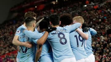 LIVERPOOL, ENGLAND - JANUARY 14: Leroy Sane of Manchester City celebrates with team mates after scoring the first Manchester City goal during the Premier League match between Liverpool and Manchester City at Anfield on January 14, 2018 in Liverpool, England. (Photo by Victoria Haydn/Man City via Getty Images)